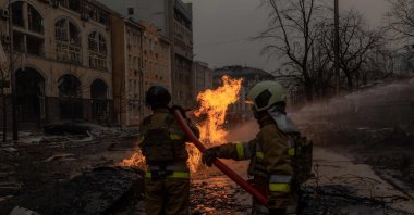 Ukrainian firefighters try to extinguish a fire on the site of a Russian missile attack, Kyiv, Ukraine, Dec. 20, 2024. (AFP Photo)