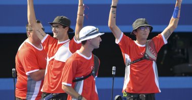 Turkish archers wave during the match against India at the Paris 2024 Olympics, Paris, France, July 29, 2024. (AA Photo)