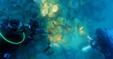 Turkish divers explore the remnants of a shipwreck in the waters off Ayvalık, a district of Balıkesir, Türkiye, July 7, 2024. (AA Photo)