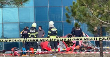 Emergency teams investigate the crash site outside Muğla Training and Research Hospital, Muğla, Türkiye, Dec. 22, 2024. (AA Photo)