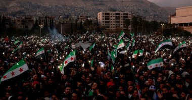 People gather during a celebration over the fall of the Assad regime, in Damascus, Syria, Dec. 20, 2024. (Reuters Photo)