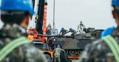 Taiwanese soldiers secure a U.S.-made M1A2 Abrams battle tank onto a trailer at an army training center, in Hsinchu County, Hsinchu, Taiwan, Dec. 16, 2024. (AFP Photo)