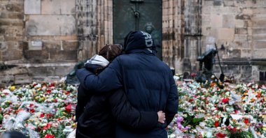 People mourn at the mourning site in front of St. John&#039;s Church following a vehicle-ramming attack in Magdeburg, Germany, Dec. 22, 2024. (EPA Photo)