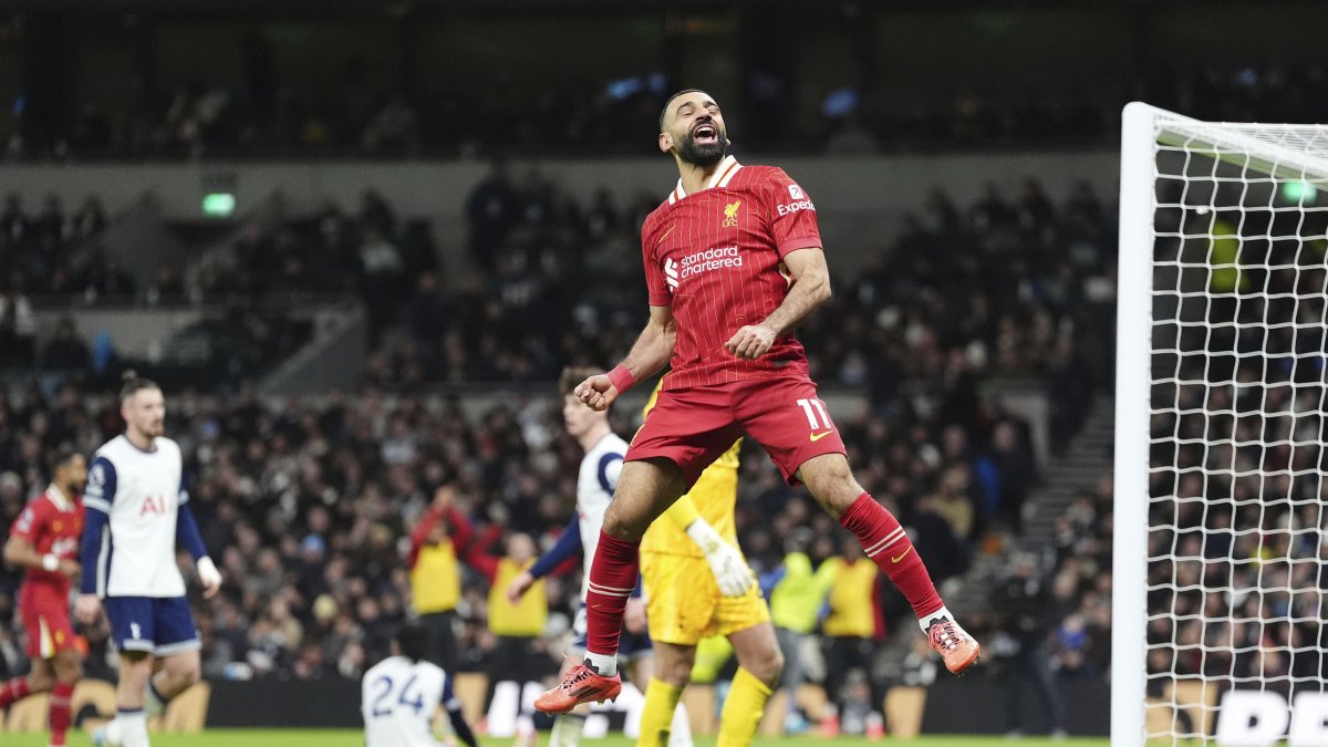 Liverpool&#039;s Mohamed Salah celebrates scoring his side&#039;s fifth goal during the English Premier League match at the Tottenham Hotspur Stadium, London, U.K., Dec. 22, 2024. (AP Photo)