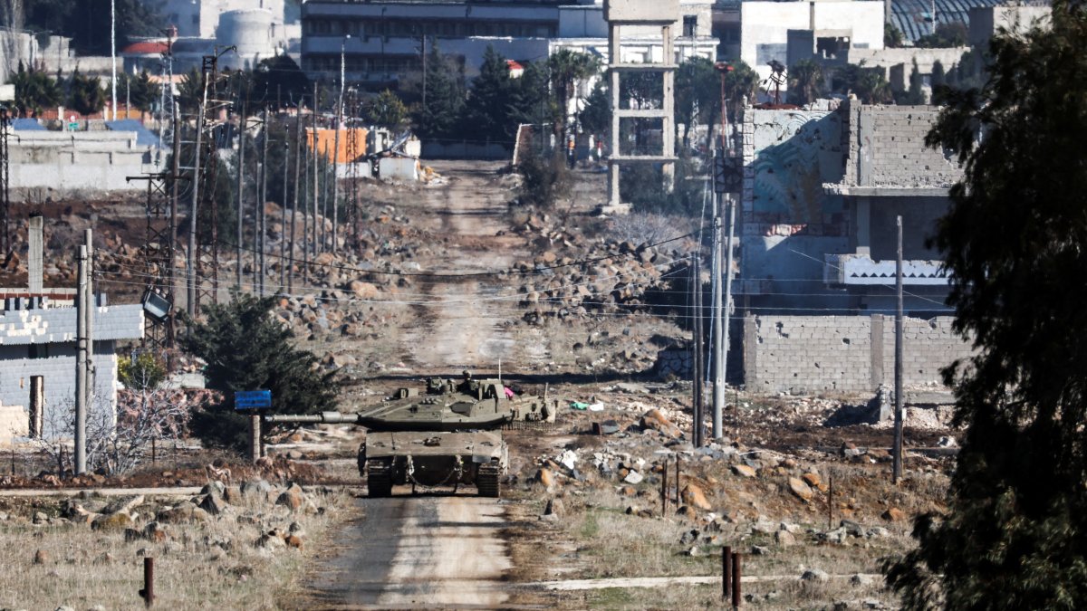 An Israeli tank maneuvers in Syria, after the ousting of Syria&#039;s Bashar Assad, as seen from Majdal Shams in the Israeli-occupied Golan Heights, Dec. 23, 2024. (Reuters Photo)