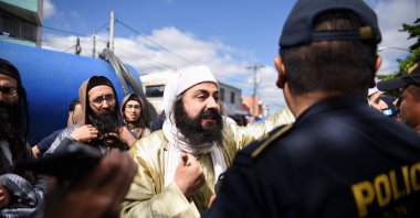 A man from the Lev Tahor Jewish sect shouts at the police in Guatemala City, Guatemala, Dec. 21, 2024. (Reuters Photo)