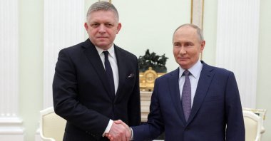 Russian President Vladimir Putin (R) shakes hands with Slovak Prime Minister Robert Fico during a meeting in Moscow, Russia, Dec. 22, 2024. (Reuters Photo)