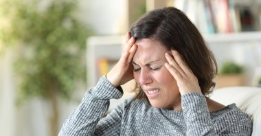 Women in Türkiye are three times more likely to experience migraines, a condition affecting millions across the country. (Shutter Stock Photo)