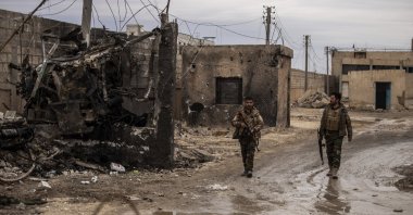 PKK/YPG terrorists patrol in Hassakeh, Syria, Feb. 8, 2022. (AP Photo)
