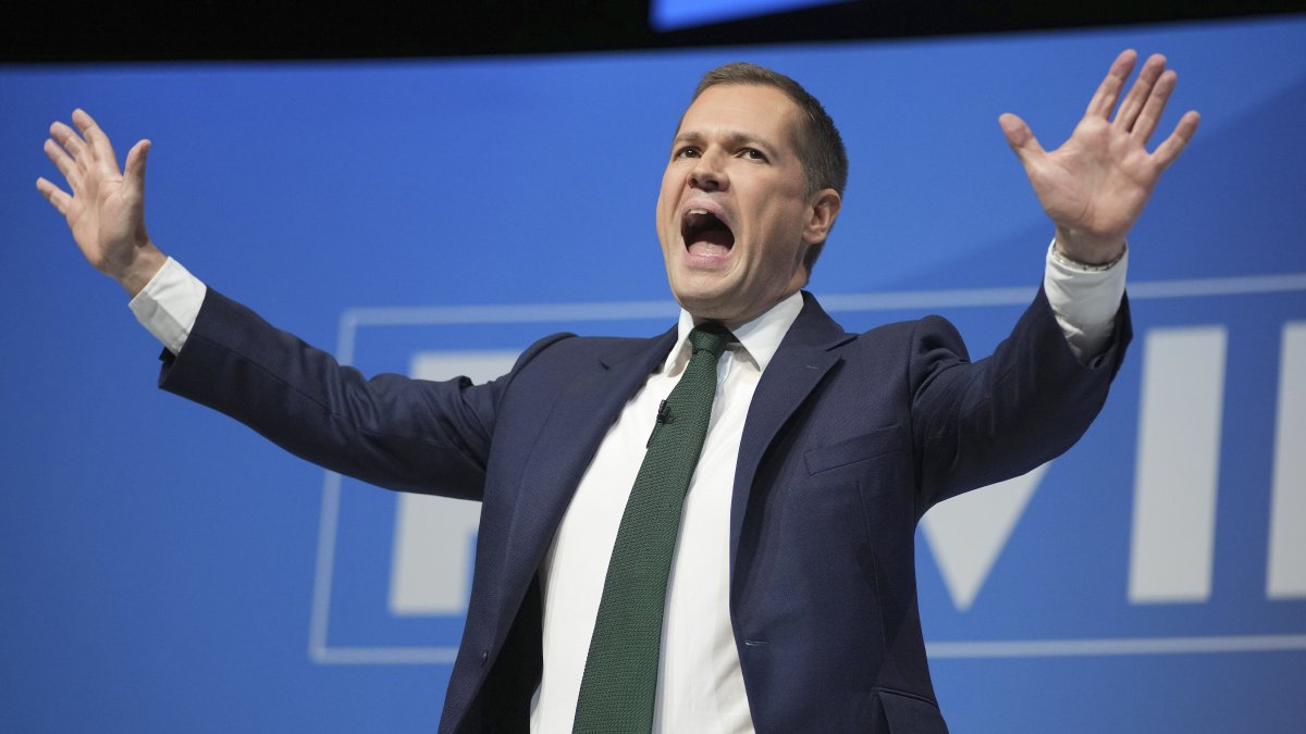 Conservative leadership candidate Robert Jenrick addresses members during the Conservative Party Conference at the International Convention Centre in Birmingham, England, Wednesday, Oct. 2, 2024.(AP Photo)