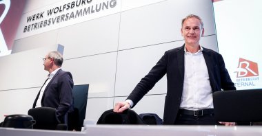 Oliver Blume, CEO of German car maker Volkswagen, and Wolfsburg VW plant manager Uwe Schwartz attend a meeting at the company's headquarters in Wolfsburg, Germany, Dec. 4, 2024. (Reuters Photo)