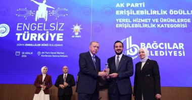 Abdullah Özdemir (C), chairperson candidate for the Justice and Development Party's (AK Party) Istanbul branch, attends an event with President Recep Tayyip Erdoğan, Ankara, Türkiye, Dec. 3, 2024. (İHA Photo)