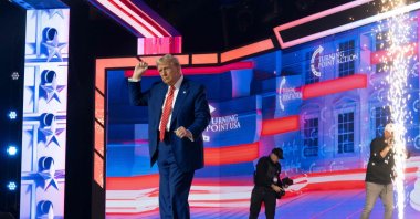 U.S. President-elect Donald Trump leaves the stage during Turning Point U.S.&#039; AmericaFest at the Phoenix Convention Center in Phoenix, Arizona, U.S., Dec. 22, 2024. (AFP Photo)