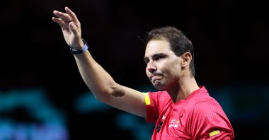 Spain&#039;s Rafael Nadal waves during a tribute to his career at the end of the quarterfinal doubles match between Netherlands and Spain during the Davis Cup Finals at the Palacio de Deportes Jose Maria Martin Carpena arena, Malaga, Spain, Nov. 19, 2024. (AFP Photo)