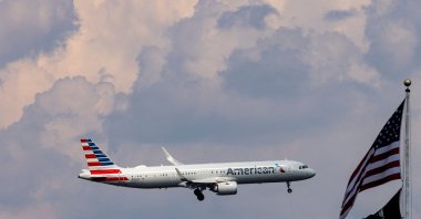 An American Airlines commercial aircraft flies over Washington as it approaches to land at Dulles International Airport, as seen from Washington, U.S., Aug. 5, 2024. (Reuters Photo)