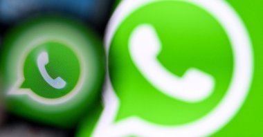 The logo of U.S. instant messaging software WhatsApp is displayed on a smartphone screen in Frankfurt am Main, western Germany, Nov. 27, 2024. (AFP Photo)