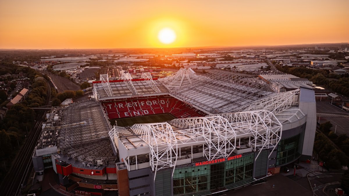 An aerial drone view of Manchester United Football Club Old Trafford Stadium at sunset, Manchester, U.K., Sept. 22, 2024. (Shutterstock Photo)