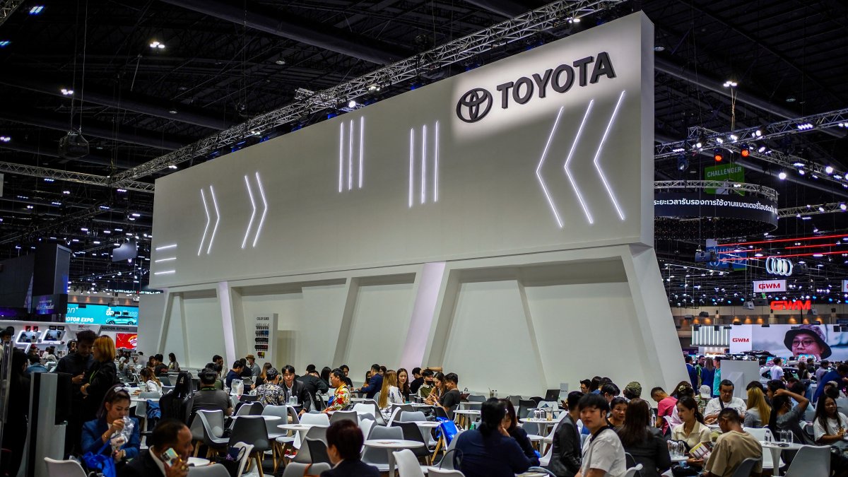 Visitors and salespeople sit inside a Toyota booth at the 41st Thailand International Motor Expo, Bangkok, Thailand, Nov. 29, 2024. (Reuters Photo)