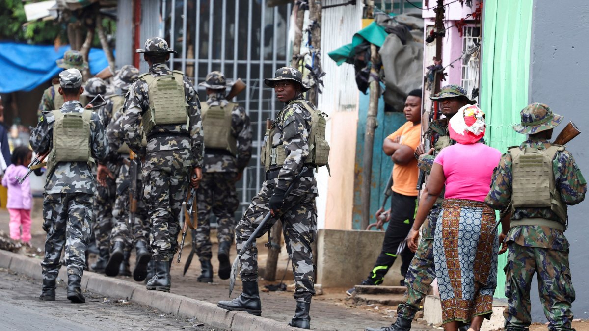 A member of the Mozambique military looks on as they patrol the streets of the capital a day after a &quot;national shutdown&quot; against the election outcome, in Maputo, Mozambique, Nov. 8, 2024. (Reuters File Photo)