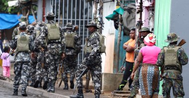 A member of the Mozambique military looks on as they patrol the streets of the capital a day after a &quot;national shutdown&quot; against the election outcome, in Maputo, Mozambique, Nov. 8, 2024. (Reuters File Photo)