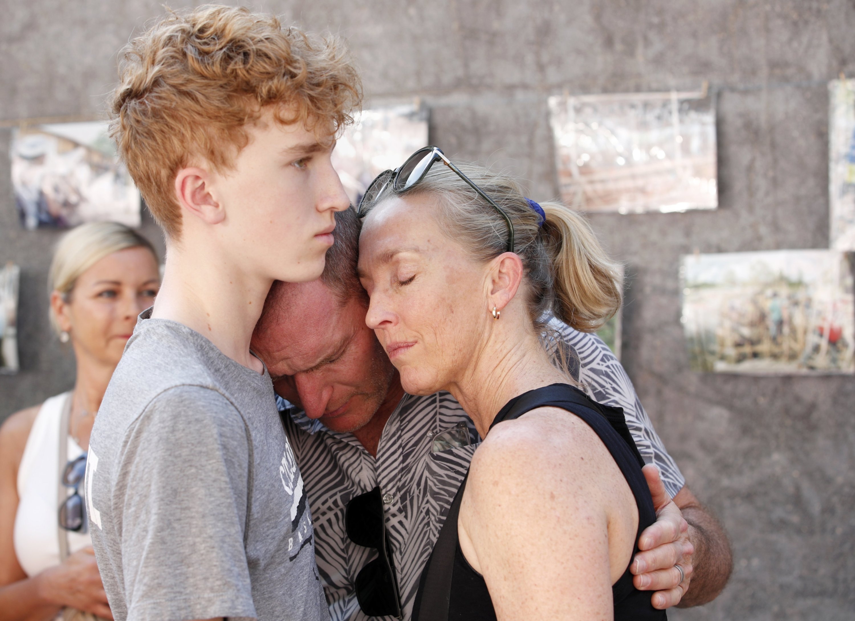 Family members of a 2004 tsunami victim comfort each other during a religious memorial service in Ban Nam Khem, Phang Nga province, southern Thailand, Dec. 26, 2024. (EPA Photo)