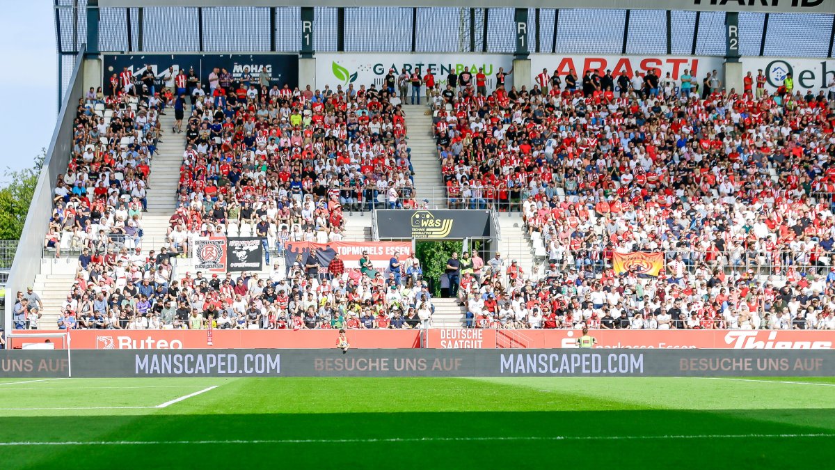 This undated photo shows Rot-Weiss Essen fans before a football match, Essen, Germany. (AP Photo)