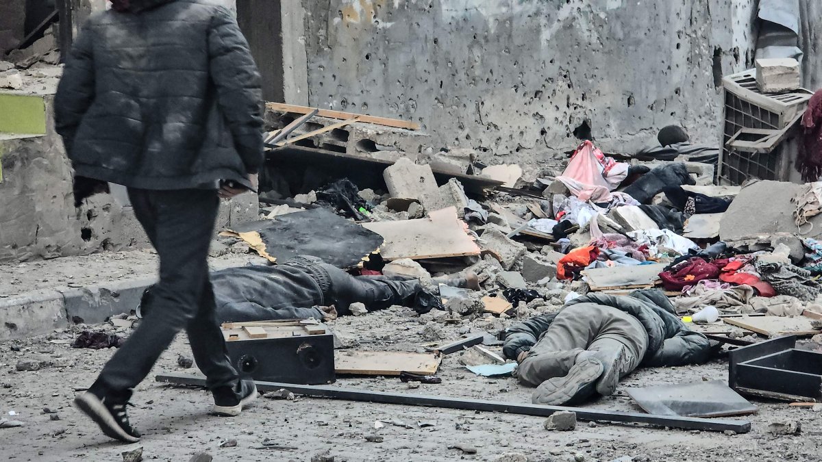  The bodies of victims lie amid the rubble in the courtyard of the Kamal Adwan hospital in Beit Lahya in the northern Gaza Strip, following an Israeli strike that hit the medical complex, Dec. 6, 2024. (AFP Photo)