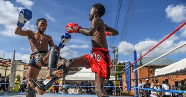Kenyan youths in action during a boxing match in the Fort Jesus area of ​​Kibera, Nairobi, Kenya, Dec. 23, 2024. (AA Photo)