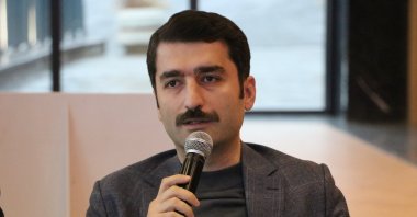 Turkish Cycling Federation Vice President Yusuf Alperen Ayar speaks at the athlete introduction event of the MCT NOX International Mountain Bike Team, Kahramanmaraş, Türkiye, Dec. 22, 2023. (AA Photo)