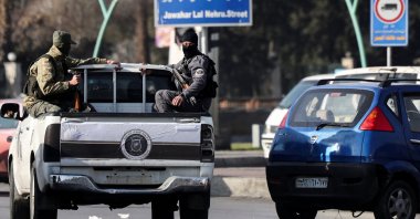 Syrian security forces members patrol in a vehicle, Damascus, Syria, December 26, 2024. (Reuters Photo)