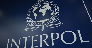 This file photo shows the logo of Interpol during the 89th Interpol General Assembly, Istanbul, Türkiye, Nov. 23, 2021. (AFP Photo)