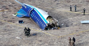 A drone view shows emergency specialists working at the crash site of an Azerbaijan Airlines passenger plane near the city of Aktau, Kazakhstan, Dec. 25, 2024. (Reuters Photo)