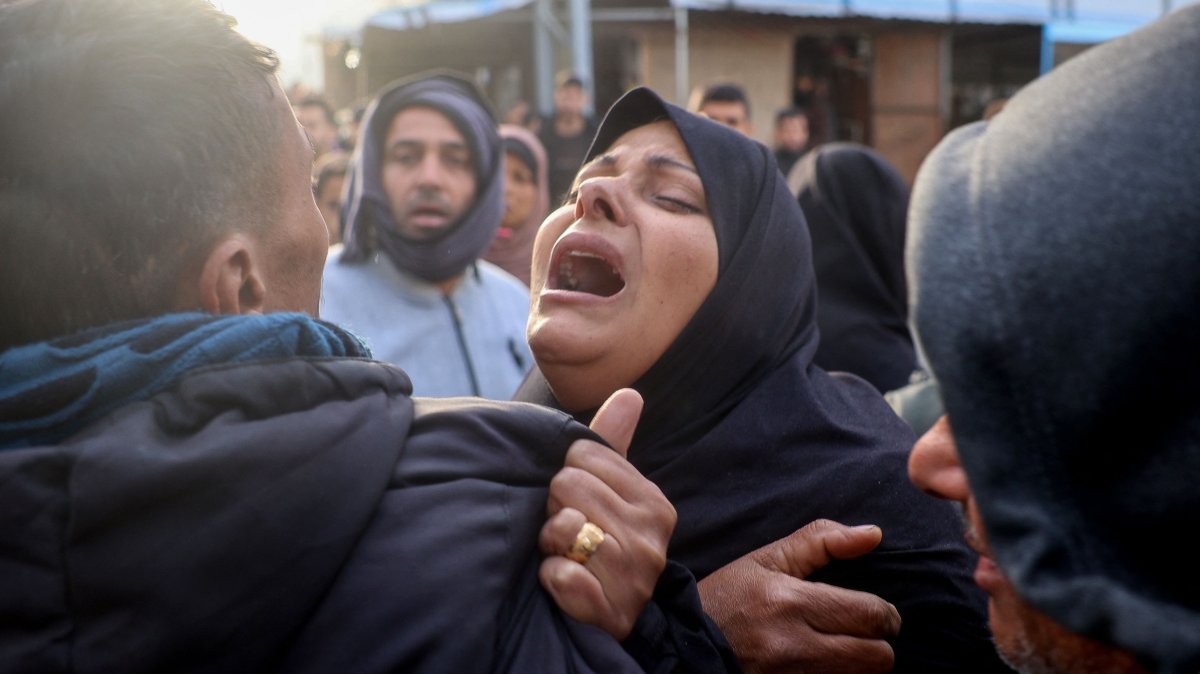 A woman reacts during the funeral of members of the press killed in an Israeli strike, at Al-Awda Hospital in the Nuseirat refugee camp, Gaza Strip, Palestine, Dec. 26, 2024. (AFP Photo)