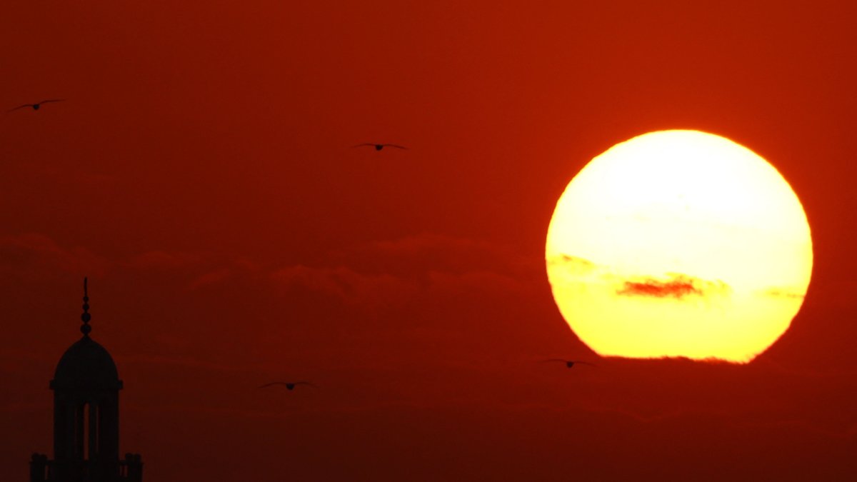 The sun sets over the marina along al-Wakra corniche south of the capital Doha, Qatar, Dec. 25, 2024. (AFP Photo)