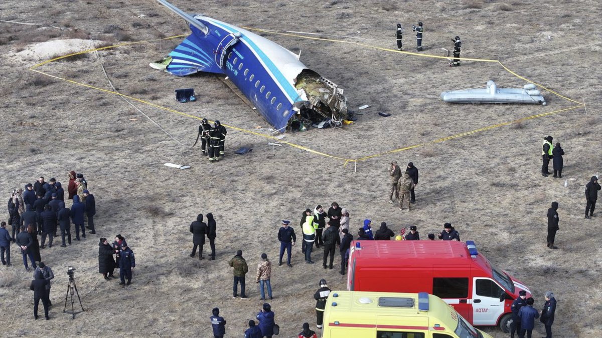 Emergency specialists work at the crash site of a passenger plane near Aktau, Kazakhstan, Dec. 25, 2024. (EPA Photo)