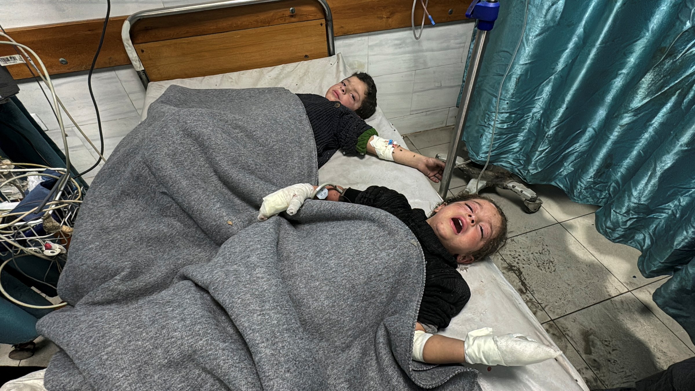 Wounded Palestinian children lie on a bed at Kamal Adwan Hospital, during the ongoing Israeli attacks, in Beit Lahiya, in the northern Gaza Strip, Dec. 17, 2024. (Reuters Photo)