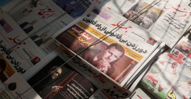 A picture of Syrian regime leader Bashar Assad is seen on a newspaper being sold at a newspaper stand, Tehran, Iran, Dec. 8, 2024. (Reuters Photo)