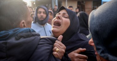 A woman reacts during the funeral of members of the press killed in an Israeli strike, at Al-Awda Hospital in the Nuseirat refugee camp, Gaza Strip, Palestine, Dec. 26, 2024. (AFP Photo)