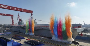 The christening of the Sichuan, China's first Type 076 new-generation amphibious assault ship, in Shanghai, China, Dec. 27, 2024. (EPA Photo)