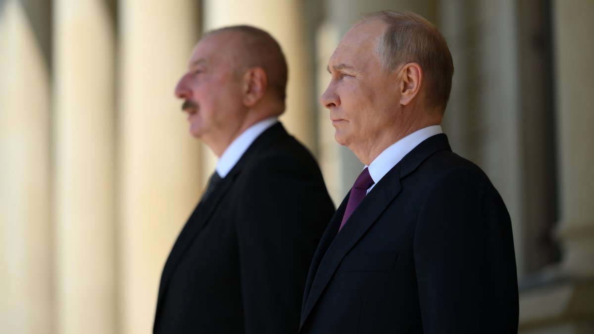 Russian President Vladimir Putin (R) and Azerbaijan&#039;s President Ilham Aliyev attend a program in Baku, Azerbaijan, Aug. 24, 2024. (EPA Photo)