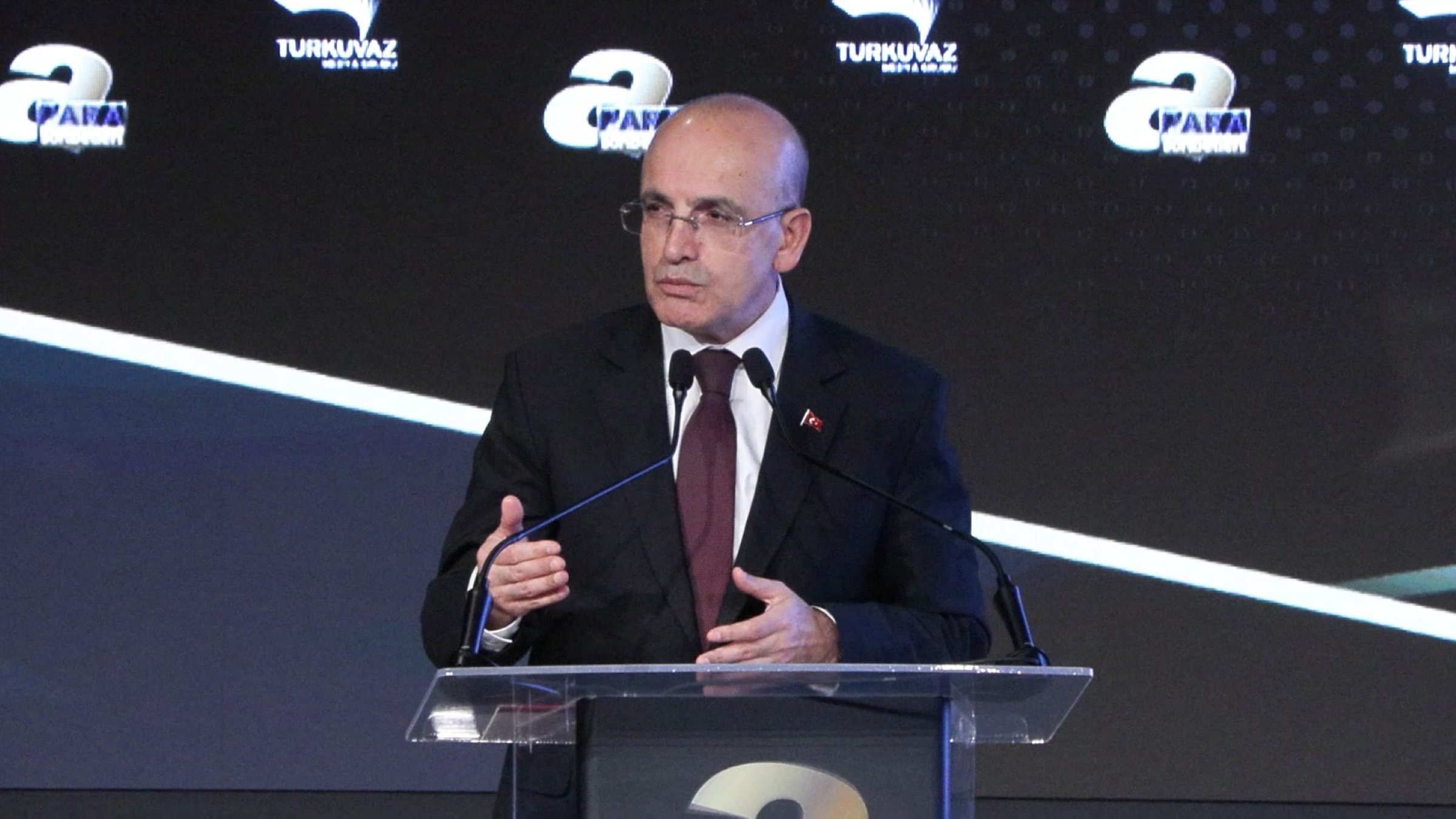 Treasury and Finance Mehmet Şimşek delivers a speech at the Future of Finance Summit, organized by Daily Sabah’s parent company, Turkuvaz Media Group, Istanbul, Türkiye, Dec. 24, 2024. (DHA Photo)