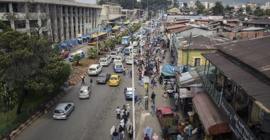 Traffic and pedestrians fill a street in Addis Ababa, Ethiopia, Nov. 3, 2022. (AP Photo)