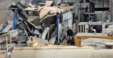 People check the damage outside the Kamal Adwan hospital after an Israeli airstrike, in Beit Lahia, northern Gaza Strip, Palestine, Dec. 6, 2024. (AFP Photo)