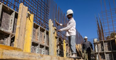 Indian builders work on a construction site in Tel Aviv, Israel, Dec. 15, 2024. (AFP Photo)