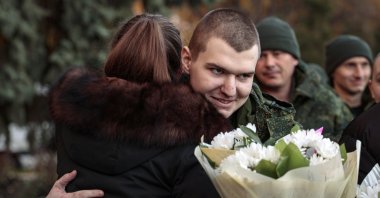 A former prisoner of war meets with relatives after his release from Ukrainian captivity in Ukraine, in Amvrosievka, Donetsk region, Ukraine, Nov. 1, 2022. (EPA File Photo)