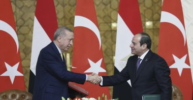 President Recep Tayyip Erdoğan shakes hands with Egyptian President Abdel Fattah el-Sissi (R) during their meeting in Cairo, Egypt, Feb. 14, 2024. (AP Photo)