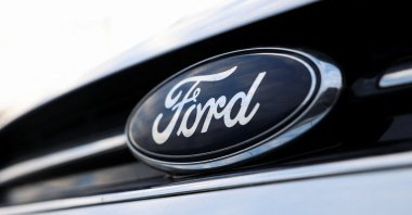 The logo of Ford is pictured on a car at the Ford Halewood transmissions plant, Liverpool, U.K., Dec. 3, 2024. (Reuters Photo)