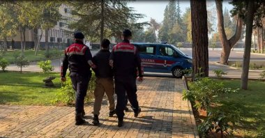 Security officers escort a captured Daesh suspect, Gaziantep, southern Türkiye, Dec. 19, 2024. (DHA Photo)