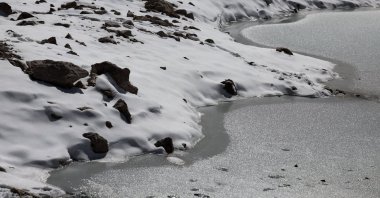 Melting ice of a small pool of the Schneeferner Glacier below Germany&#039;s highest mountain Zugspitze, near Garmisch-Partenkirchen, Germany, Sept. 26, 2023. (EPA Photo)