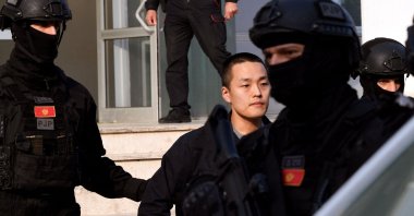 Montenegrin police officers of the PJP (Special Police Unit) escort South Korean cryptocurrency entrepreneur Do Kwon (C) at the exit of a court in Podgorica, Montenegro, March 23, 2024. (AFP Photo)